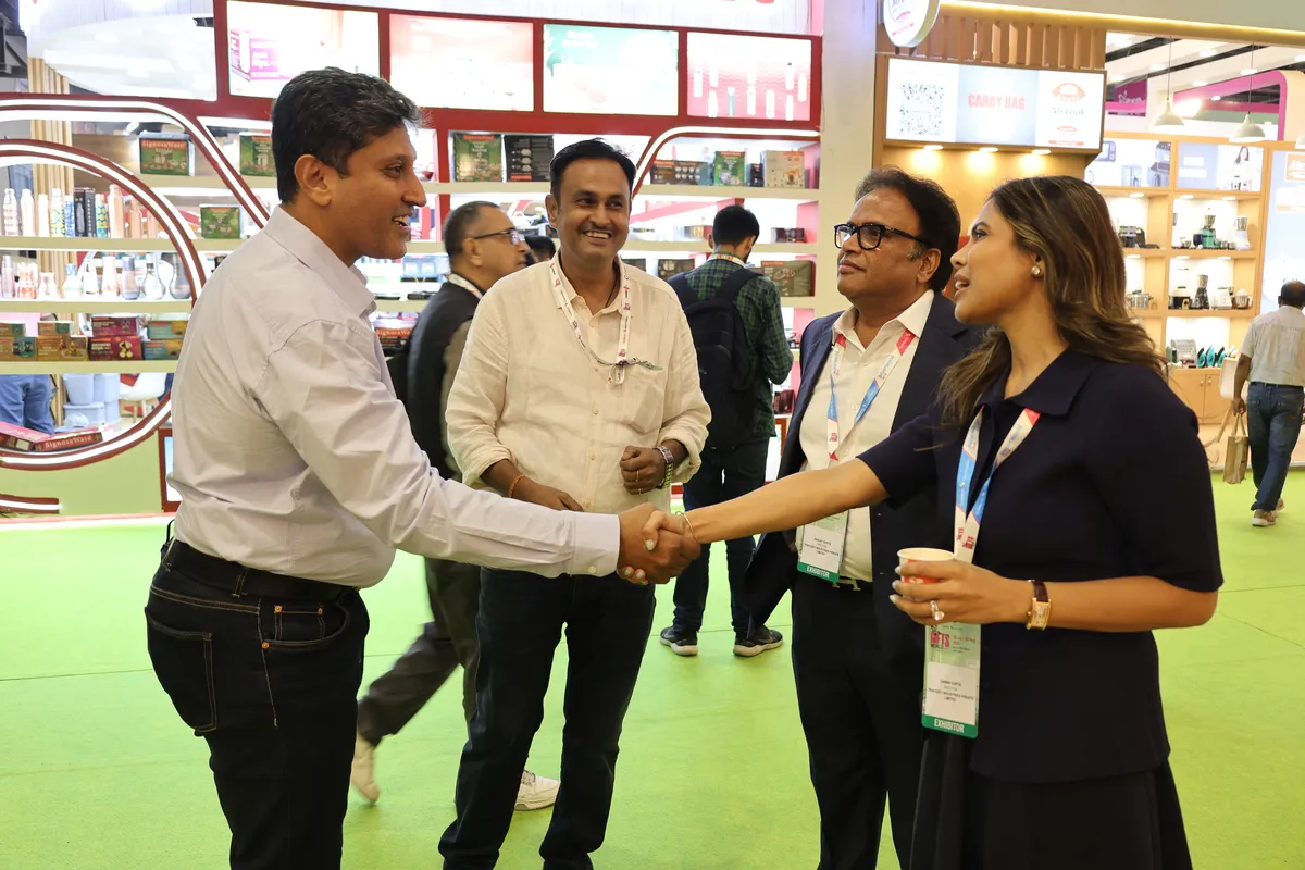 Travozet representatives meeting buyers at an industry event