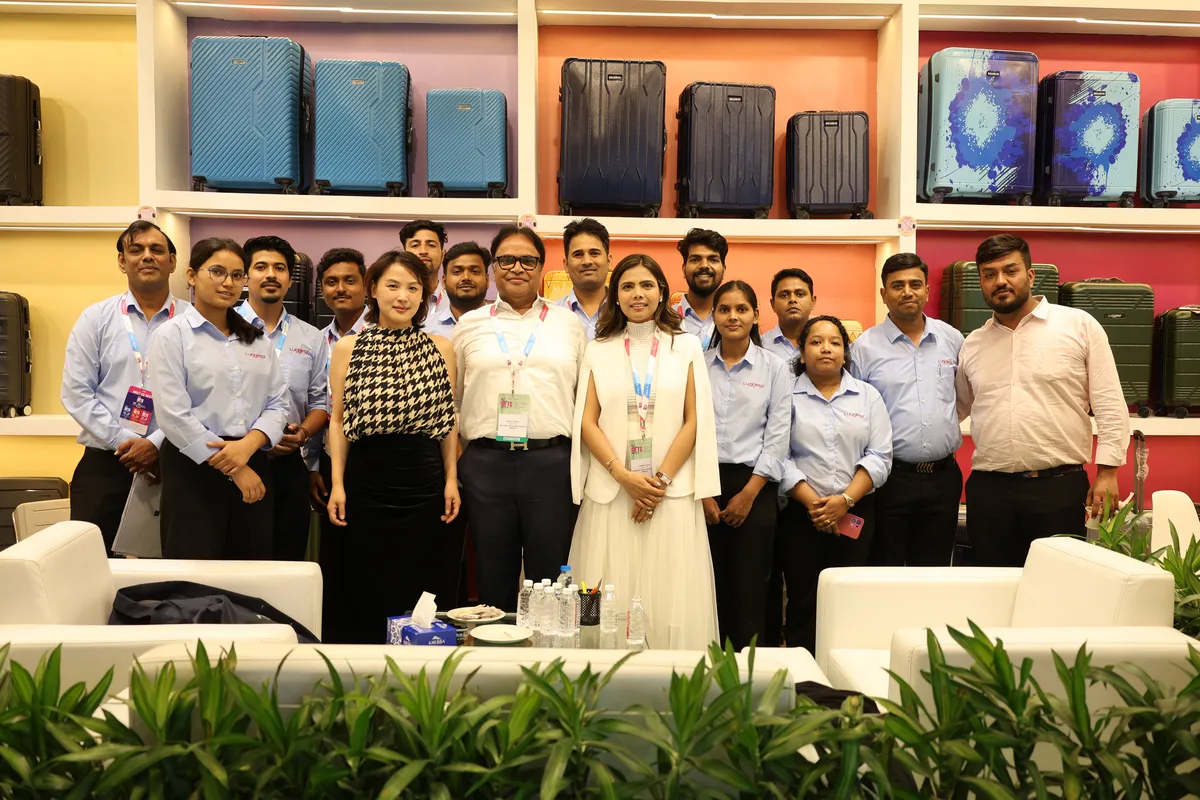 Travozet and Luggero team members at an industry event.