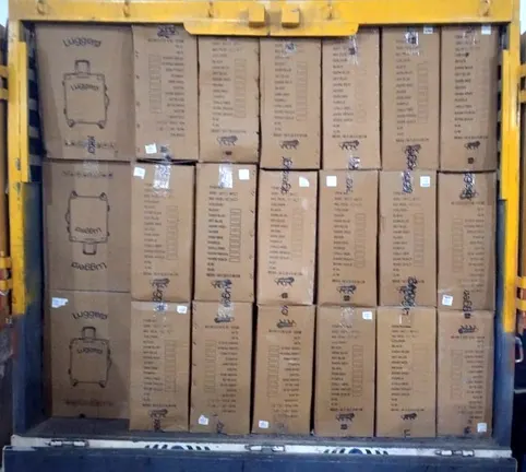 Packed luggage cartons loaded for logistics